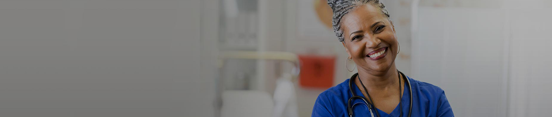 Nurse smiling in hospital setting